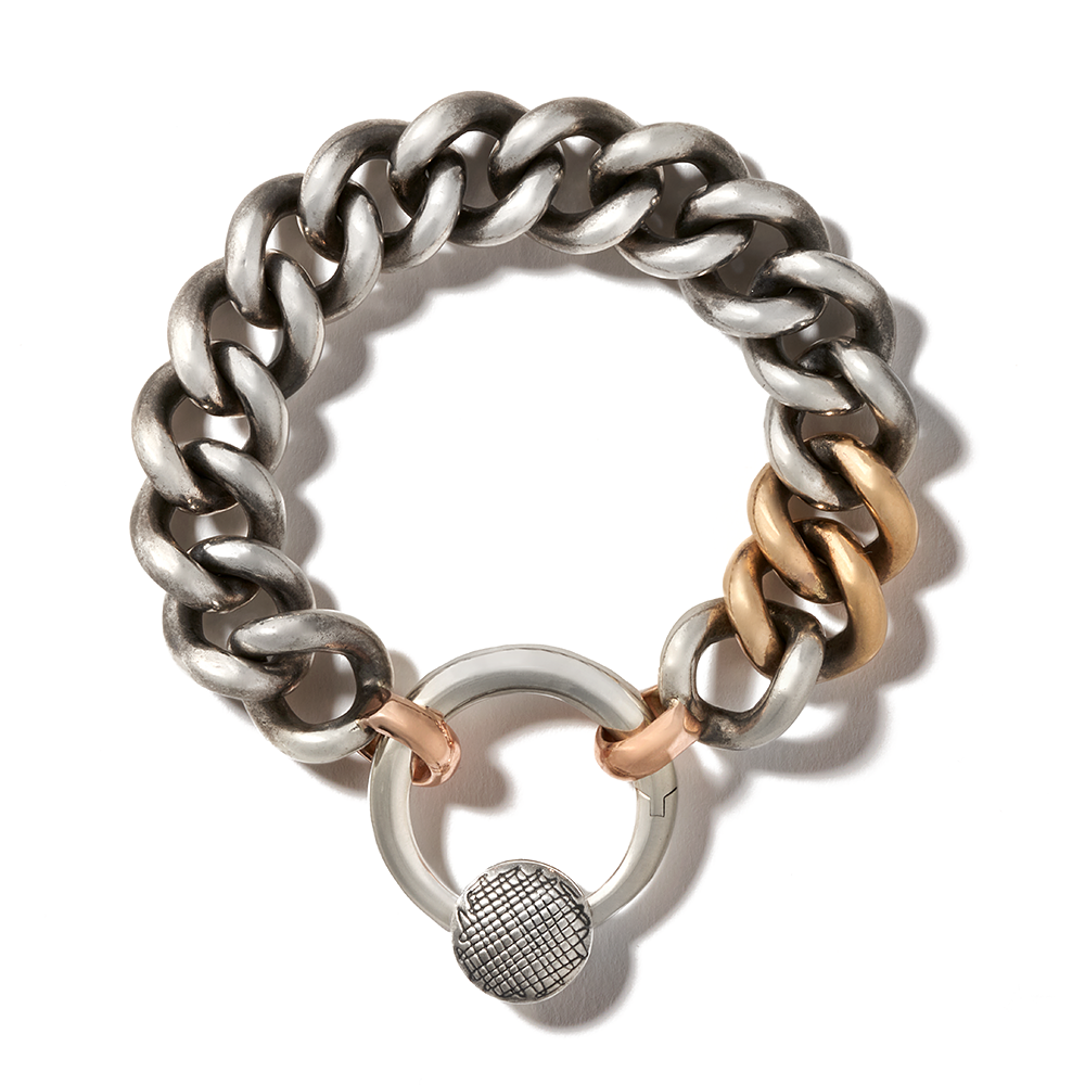 Disc charm attached to thick silver bracelet chain