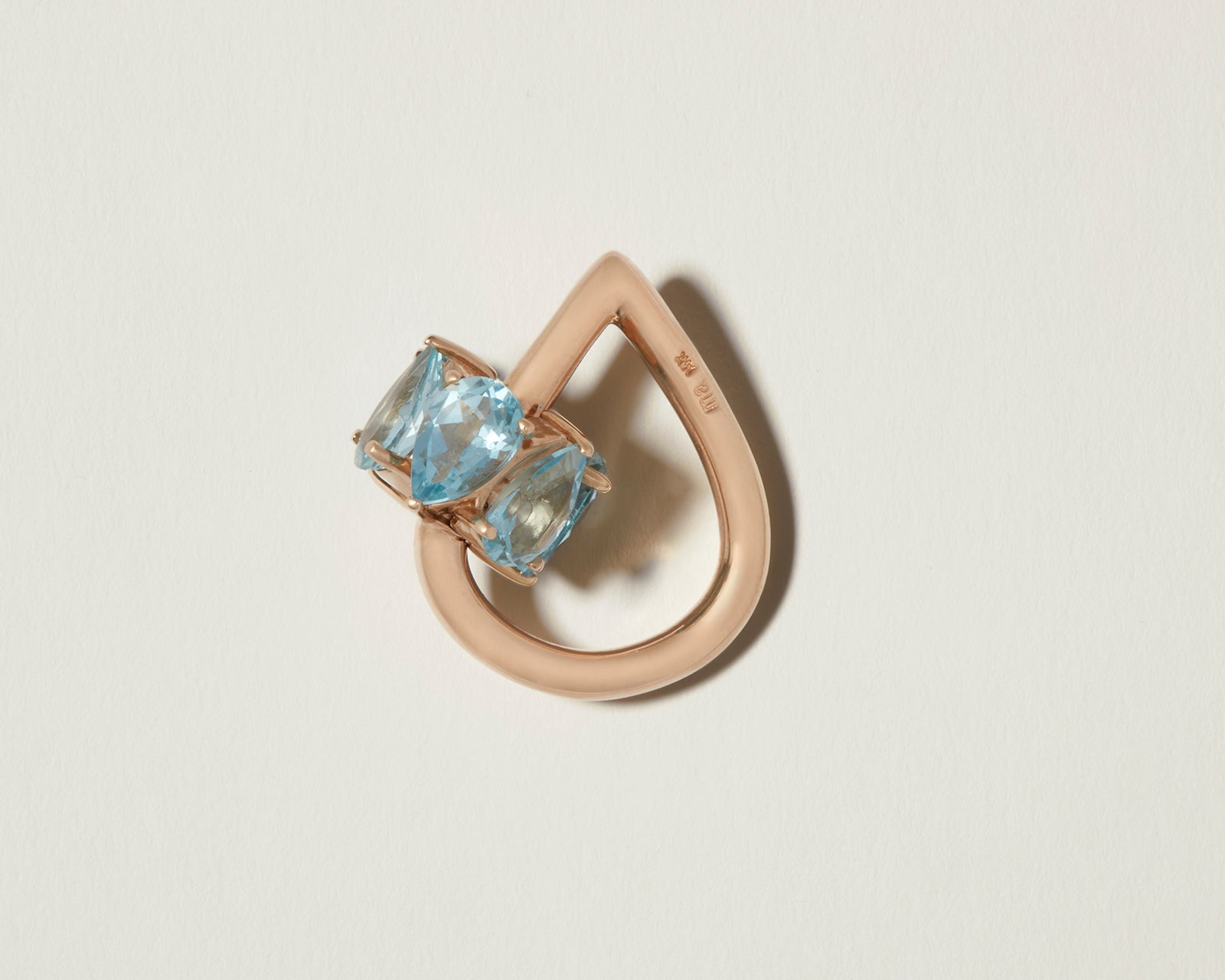 Gold droplock charm with blue gemstones