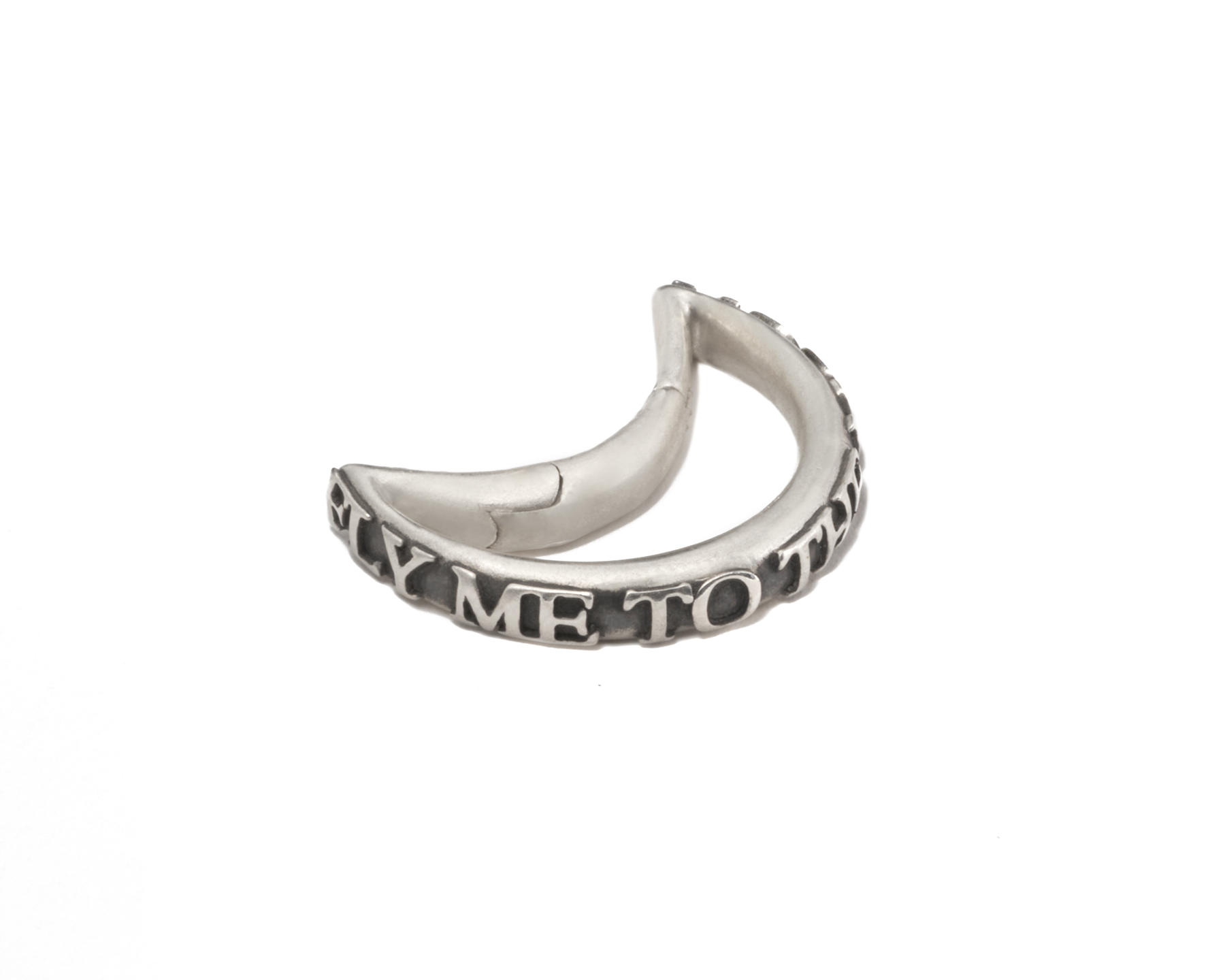 Angled side shot of fly me to the moon necklace charm
