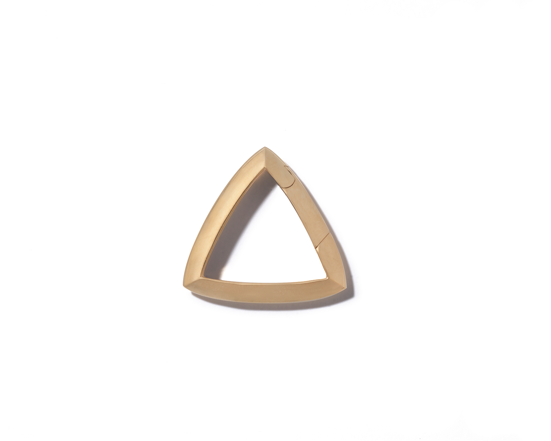 Rose gold triangle lock against white backdrop