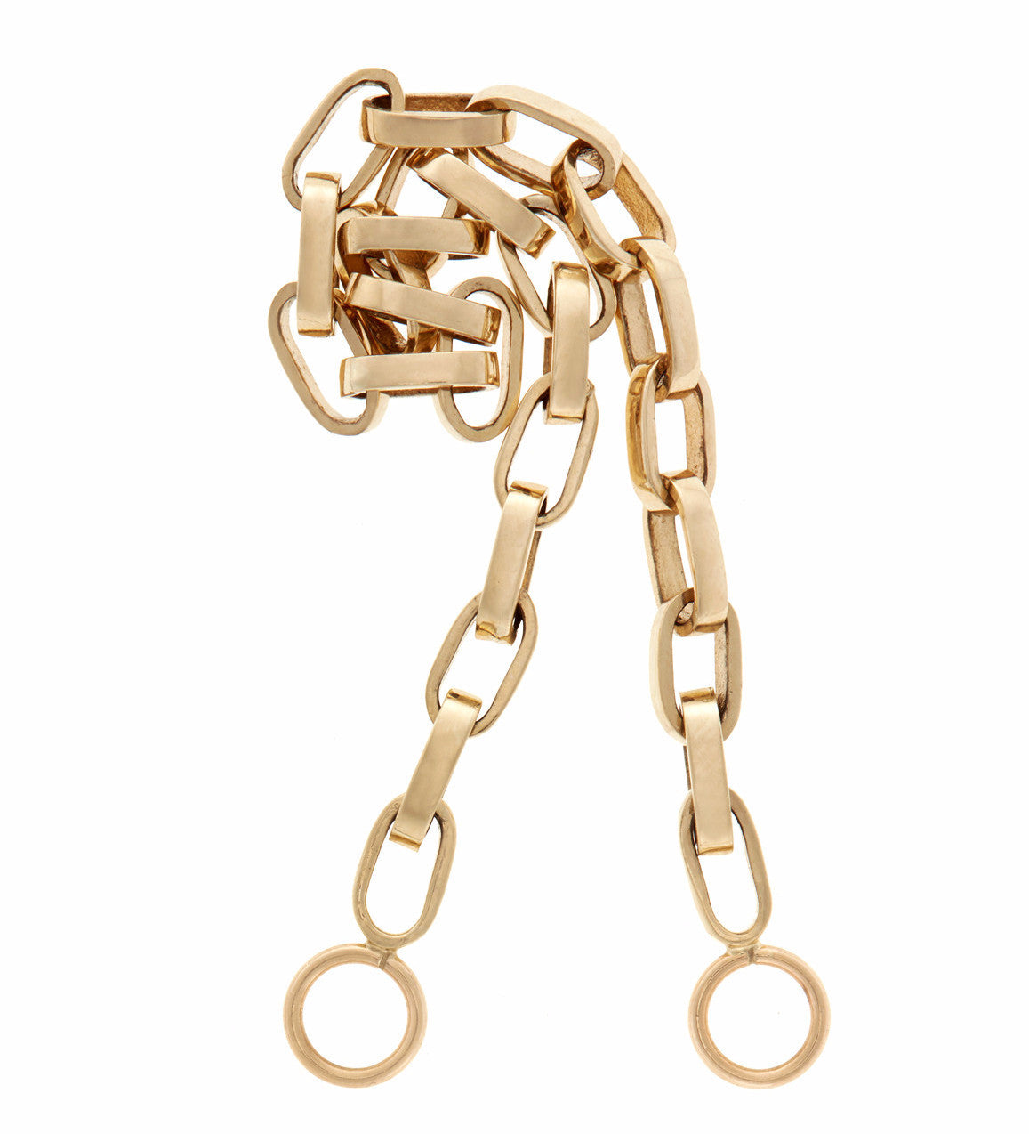 Curled up gold Marla Aaron biker chain against white backdrop