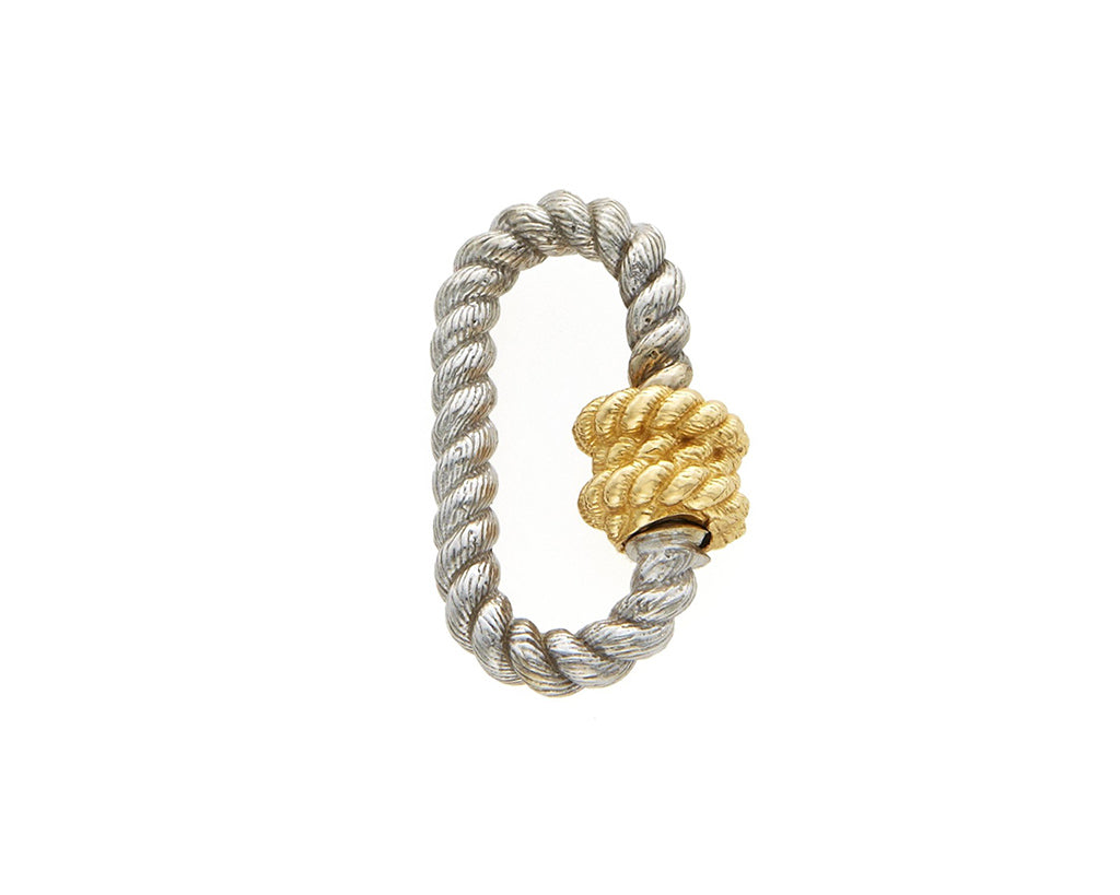 Silver twist lock with yellow gold clasp against white backdrop