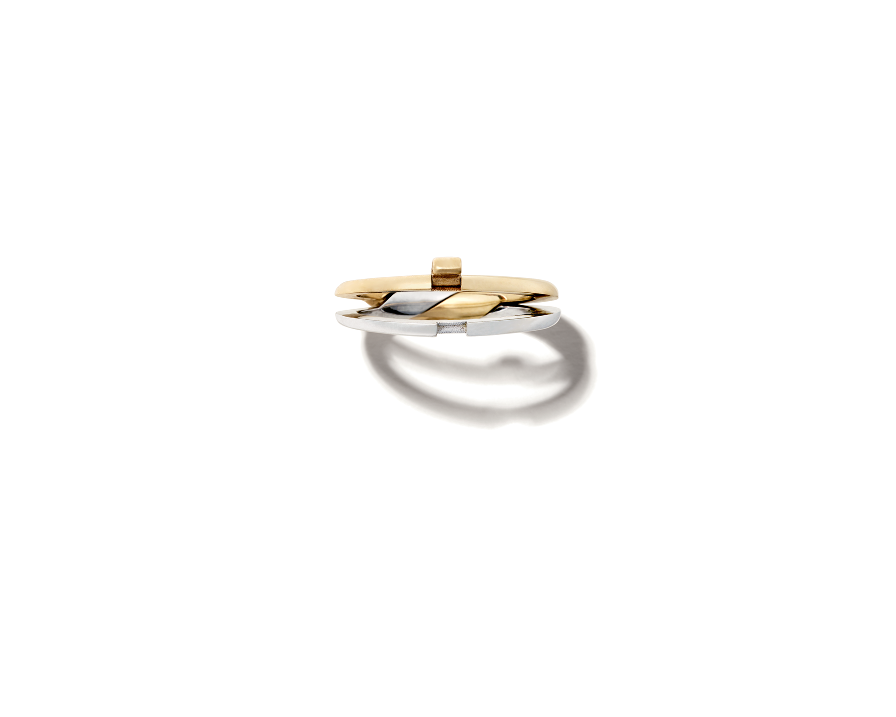 Front view of white gold and yellow gold intertwine ring with two rings separating