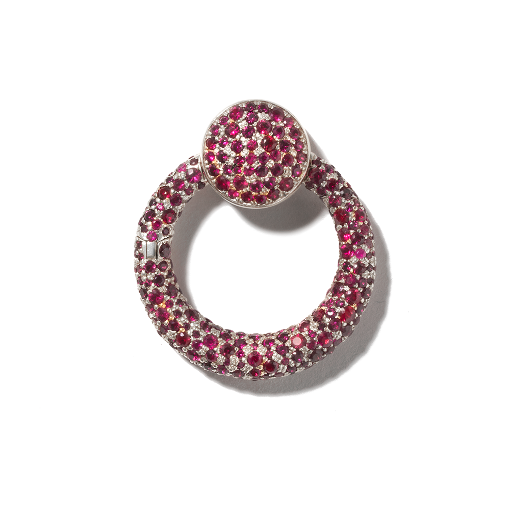 White gold ruby studded charm with closed clasp