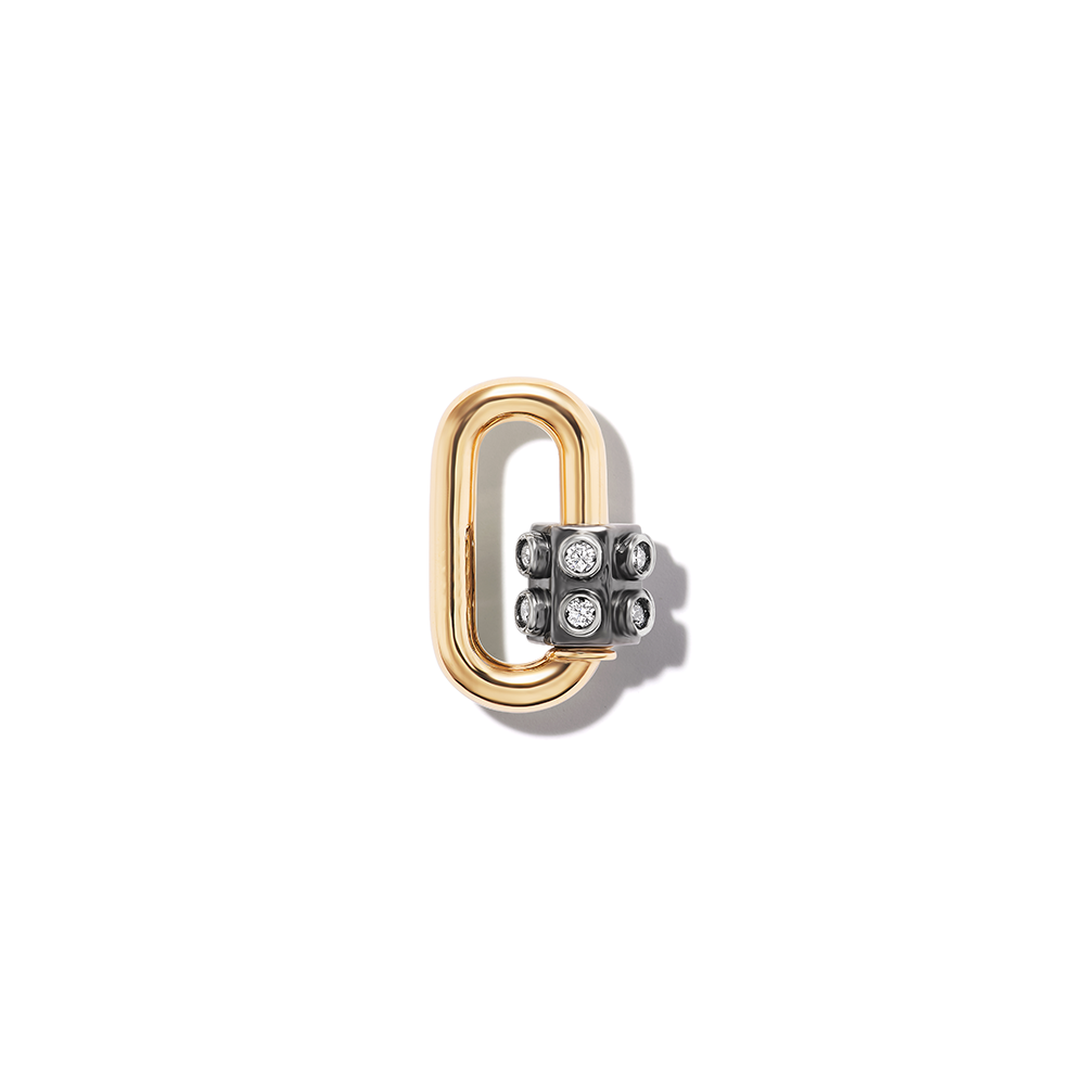 Yellow gold stoned lock charm with closed clasp