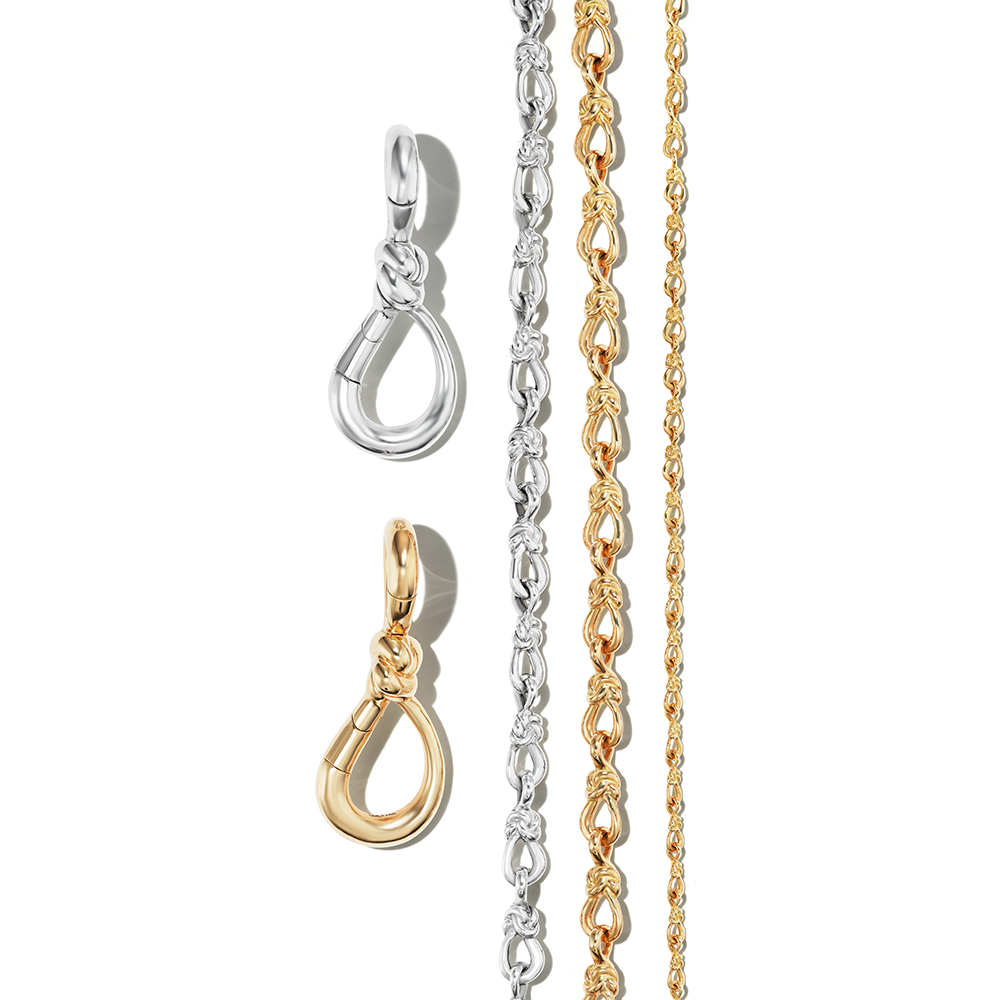 Two lover's knot charms alongside gold and silver chunky knot chains