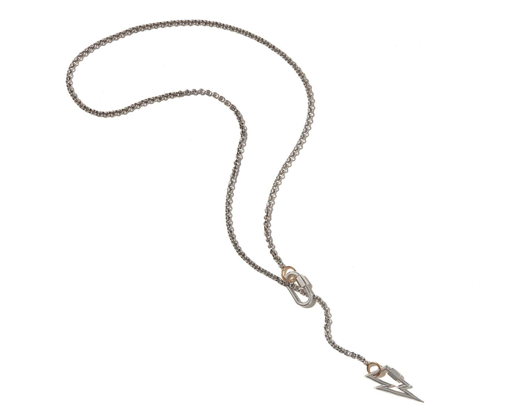 Silver lightning bolt pendant attached to long necklace chain against white backdrop