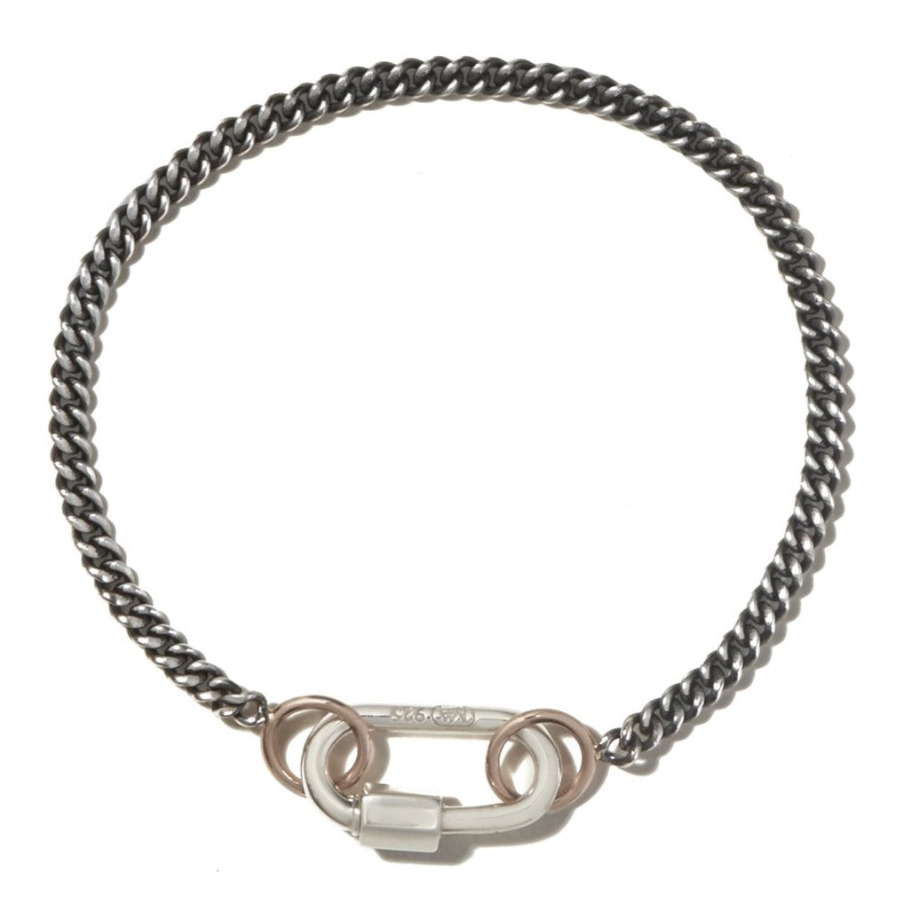 Thin curb chain bracelet with lock charm
