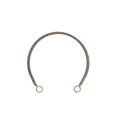 Curb chain bracelet against white backdrop