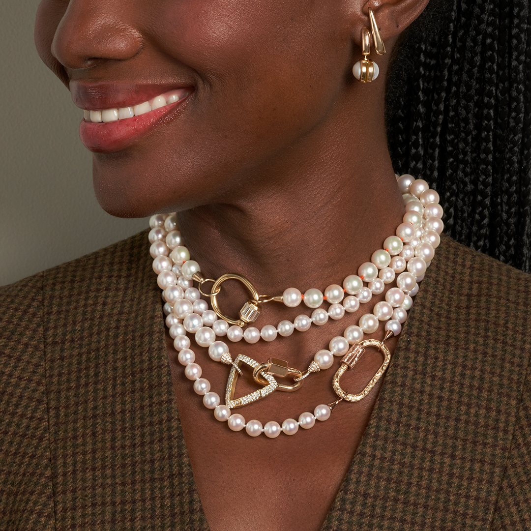 Woman wearing custom pearl jewelry
