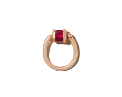 Rose gold ruby ring with trundle lock against white backdrop