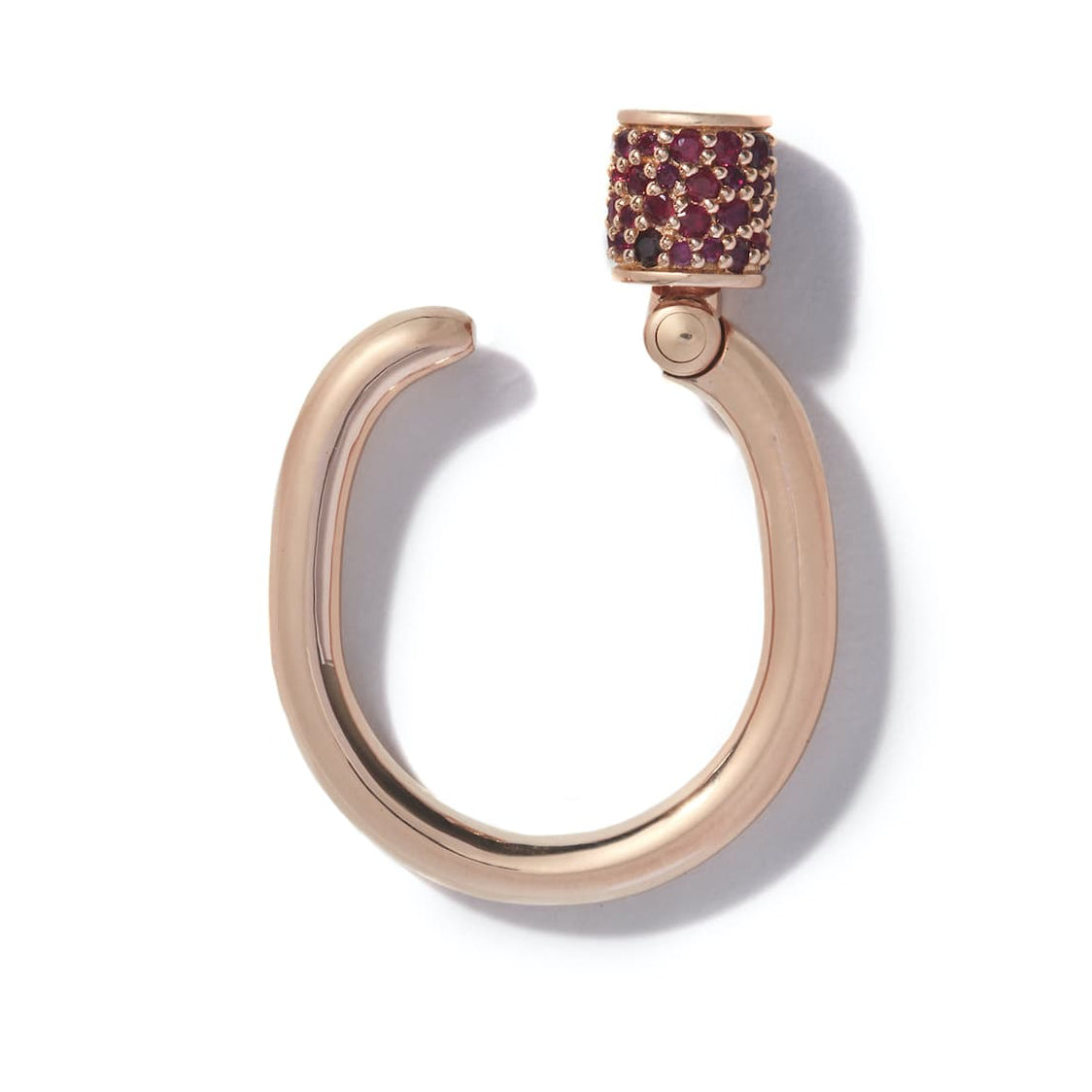 Close up of two hands wearing many rings including multiple stoned trundle rings