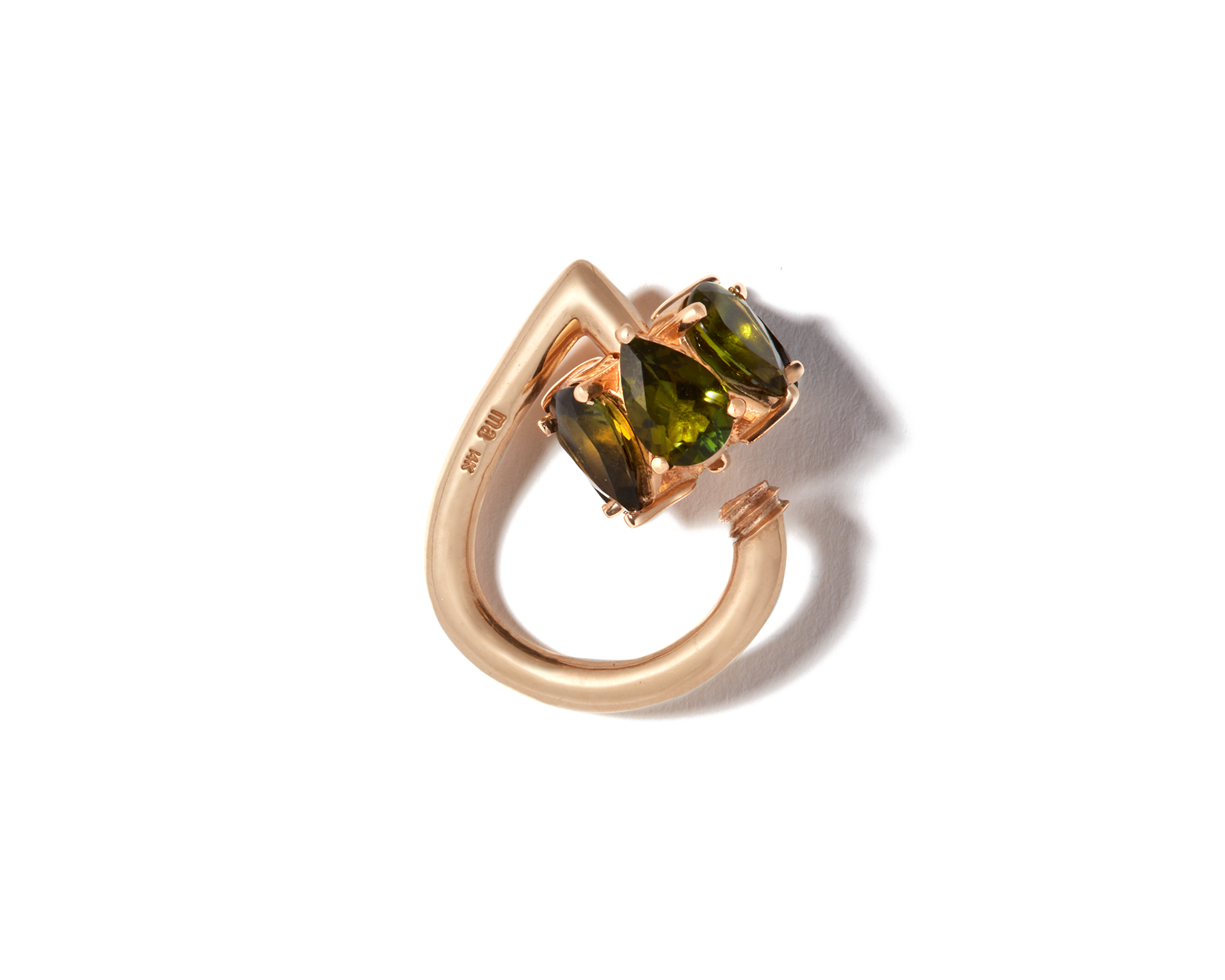 Gold drop gemstone jewelry lock with open green gemstone clasp