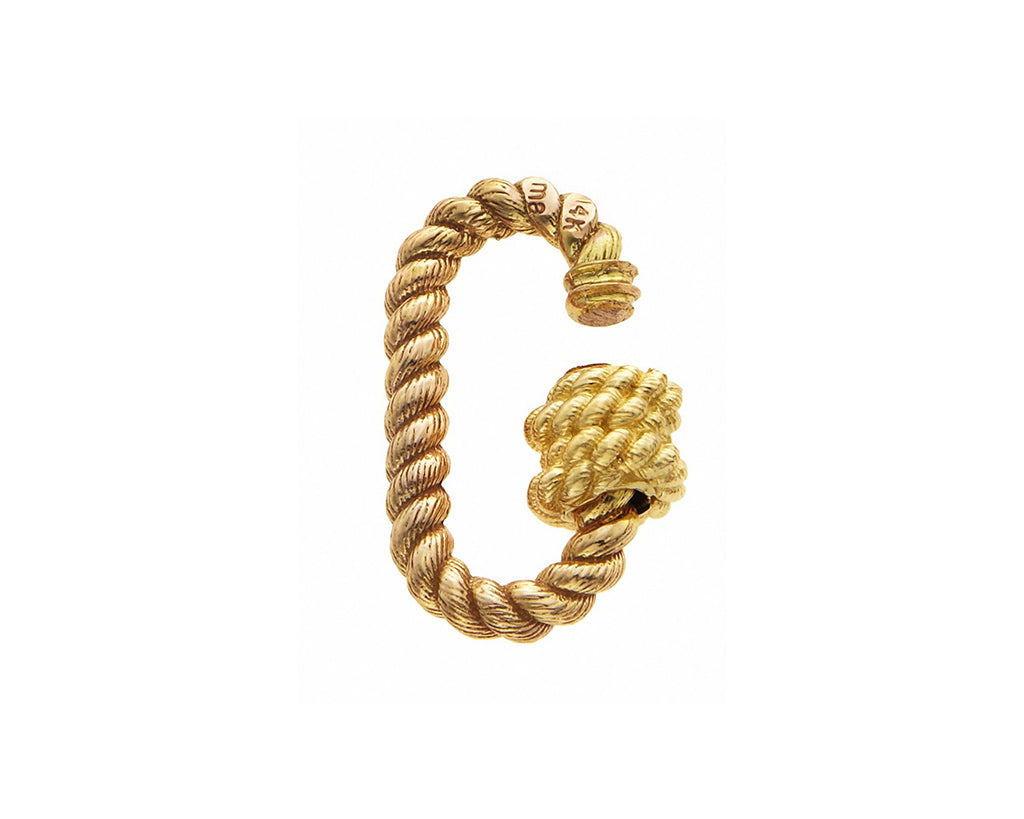 Rose gold twisted lock charm with open yellow gold clasp against white backdrop