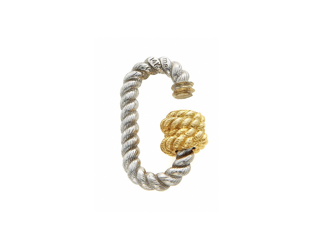 Silver twisted lock charm with open yellow gold clasp against white backdrop