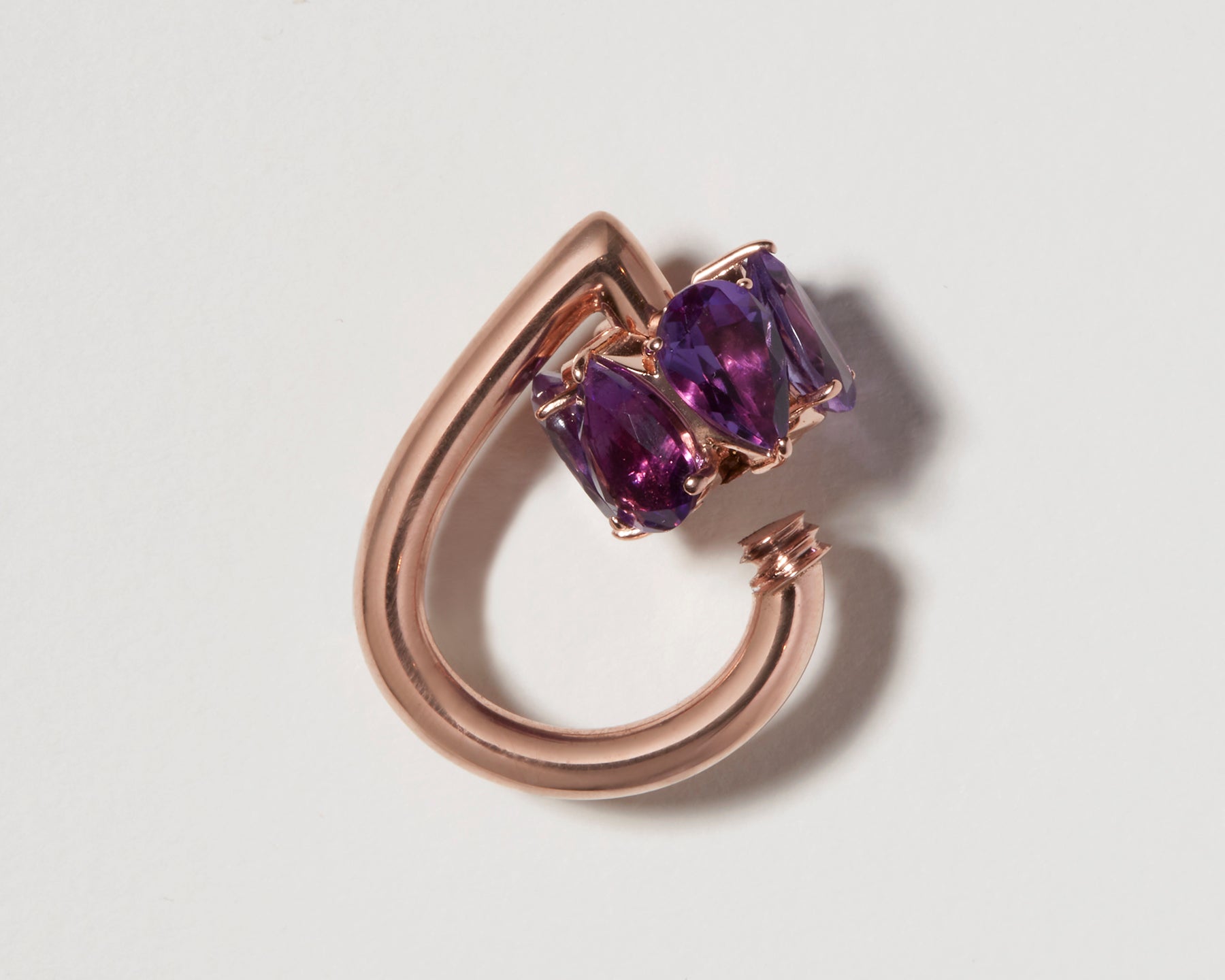 Rose gold drop lock charm with open purple gemstone clasp