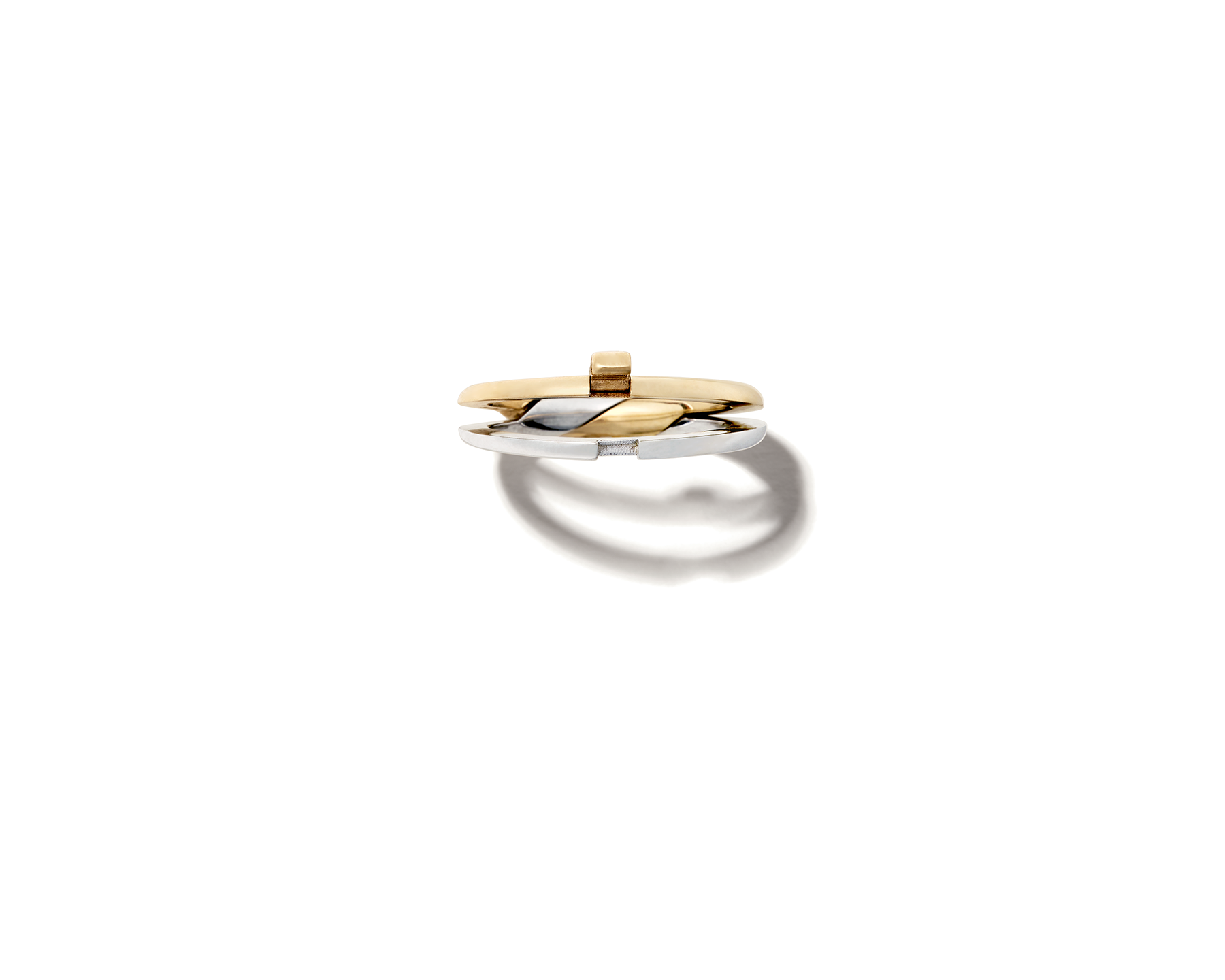 Front view of white gold and yellow gold intertwine ring with two rings separating 